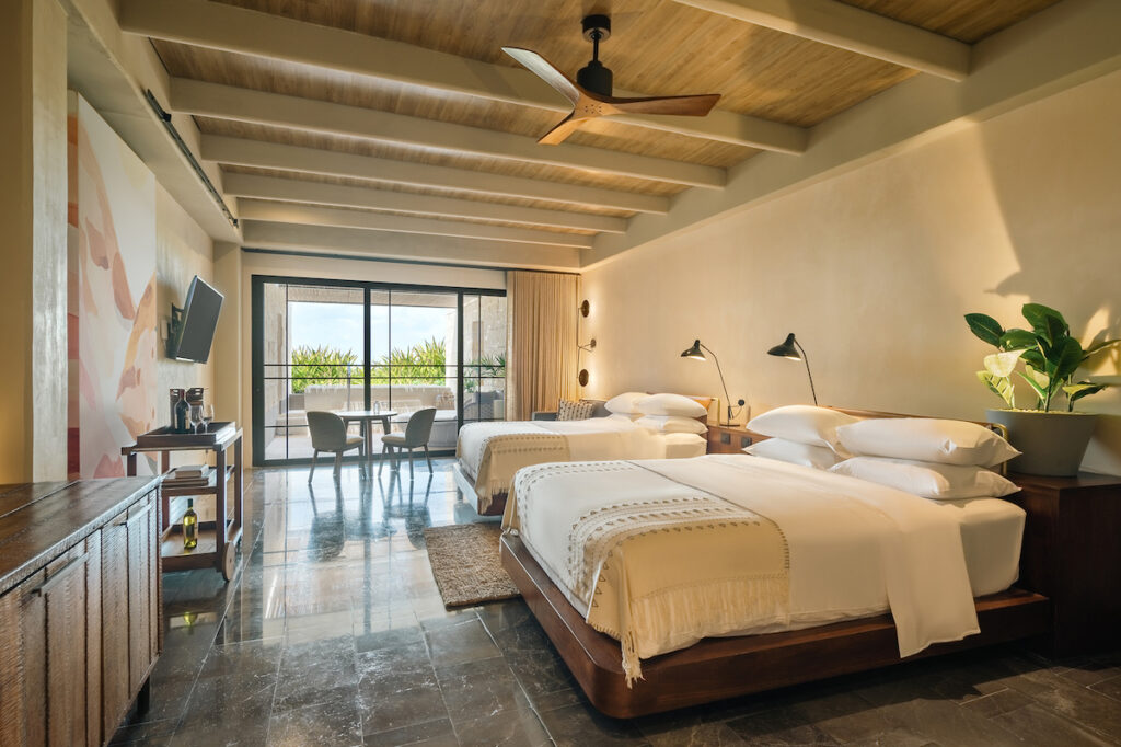 A photo of a double junior suite at Atelier Playa Mujeres, one of our favorite Mexico All Inclusive Resorts.