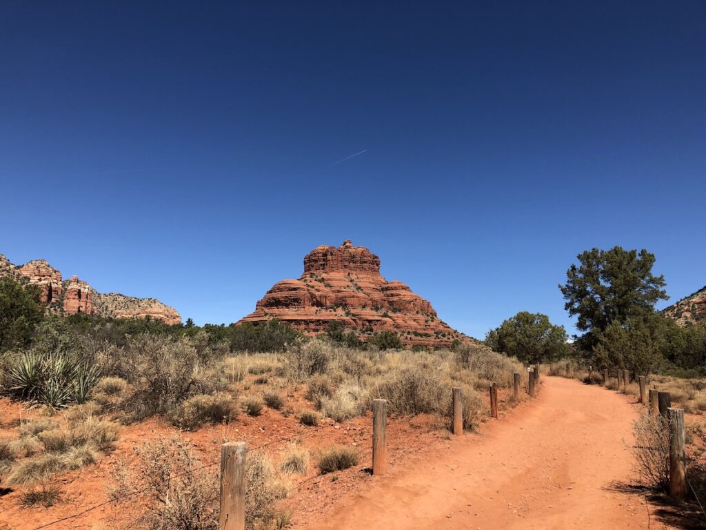 A photo of Bell Rock rising above the Bell Rock Pathway in Sedona, Arizona.

If you have one day in Sedona, don't miss the Bell Rock Pathway.