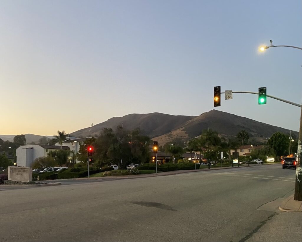 An image San Luis Obispo just after sunset. You should stop in San Luis Obispo on your California road trip.